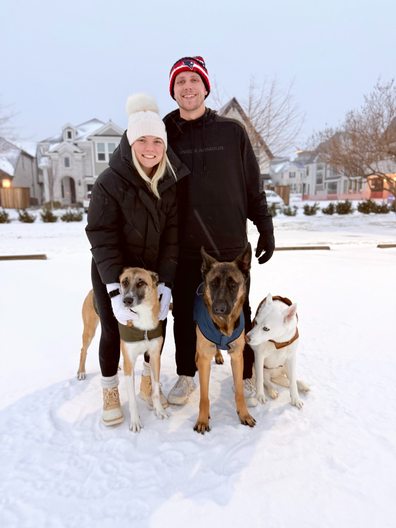 Bradly and Madi with their dogs